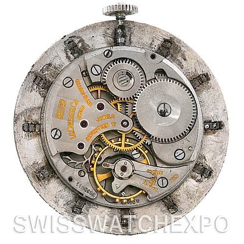 The image shows the internal mechanism and gears of a Vintage Vacheron Constantin watch, viewed from the back.