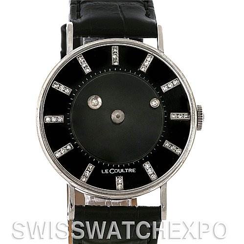 The image shows a front view of a Vintage Vacheron Constantin watch with a black dial and a black leather strap.