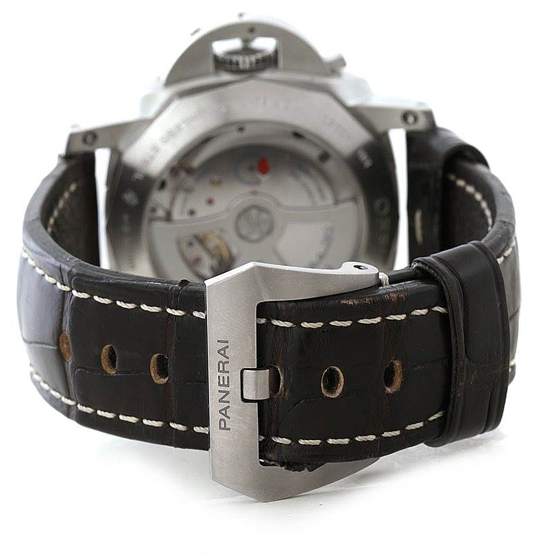 This image of the Panerai Luminor PAM00320 Men's Stainless Steel Black Dial PAM00320 Men's Stainless Steel Black Dial watch shows the back of the case and the leather strap with a visible buckle.