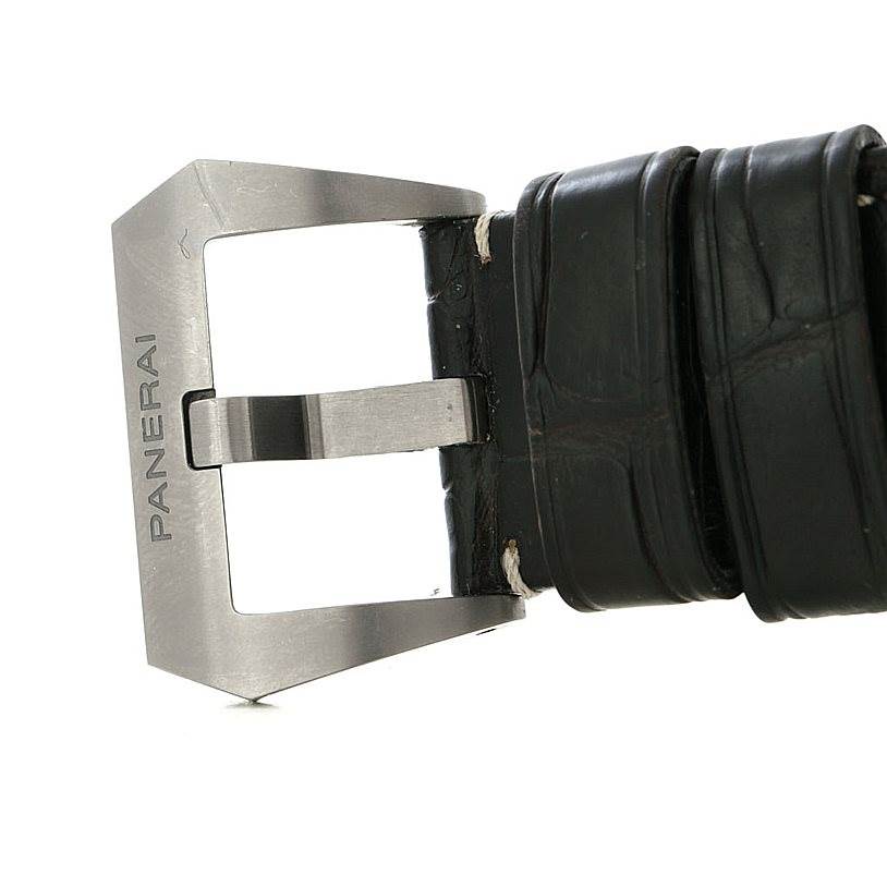 This image shows a close-up of the buckle and part of the leather strap of a Luminor model by Panerai.