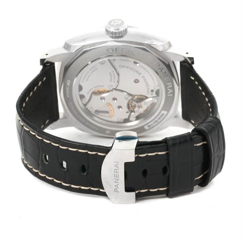 The image shows the back view of the Panerai Radiomir PAM00516 Men's Stainless Steel Black Dial PAM00516 Men's Stainless Steel Black Dial watch, highlighting the movement and the black leather strap with stitching.