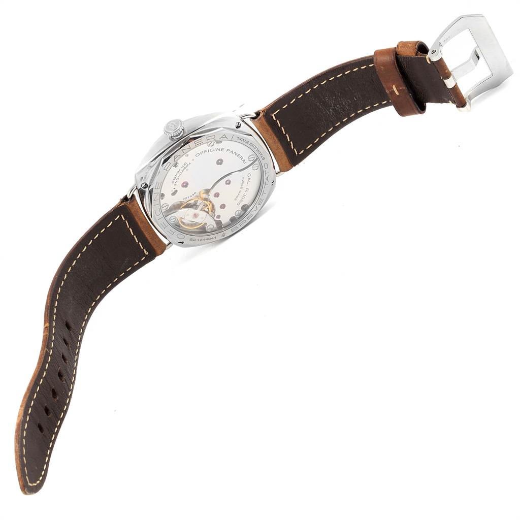 The image shows the back view of a Radiomir watch by Panerai, highlighting the leather strap and the transparent case back.