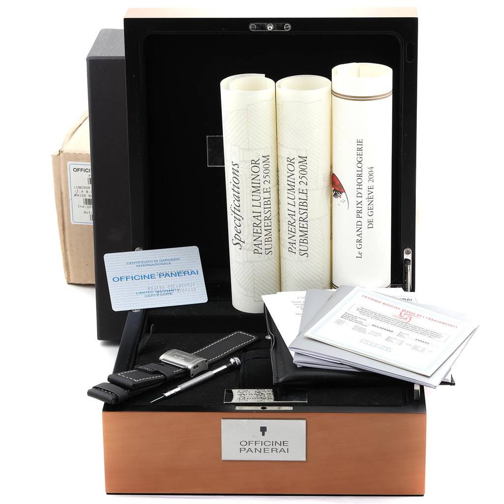 The image shows a Panerai Submersible PAM00194 Men's Titanium Black Dial PAM00194 Men's Titanium Black Dial watch box, manuals, papers, and a strap-changing tool.