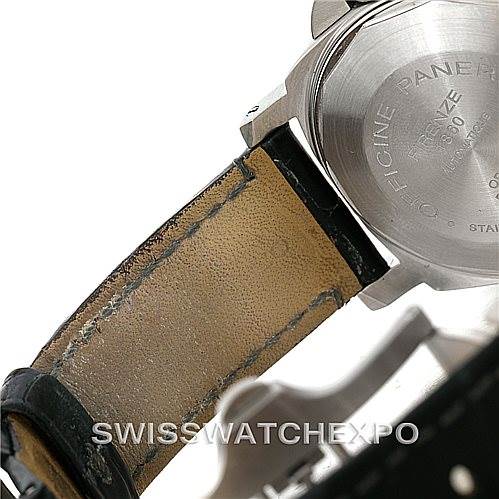 The image shows the back of a Panerai Luminor PAM119 Men's Stainless Steel Blue Dial PAM119 Men's Stainless Steel Blue Dial watch, focusing on the case back and partially worn leather strap.